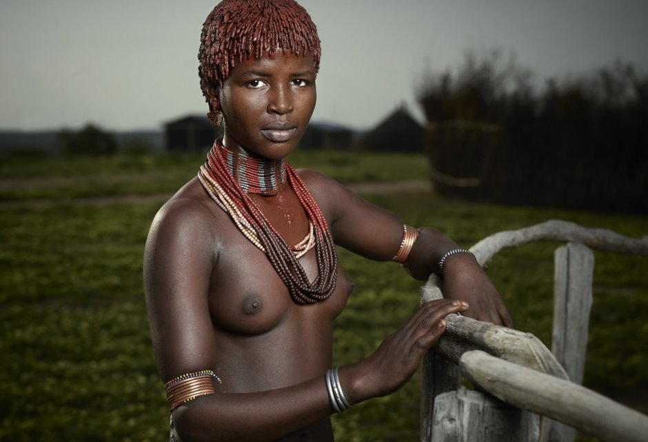 Nude women with tribal people