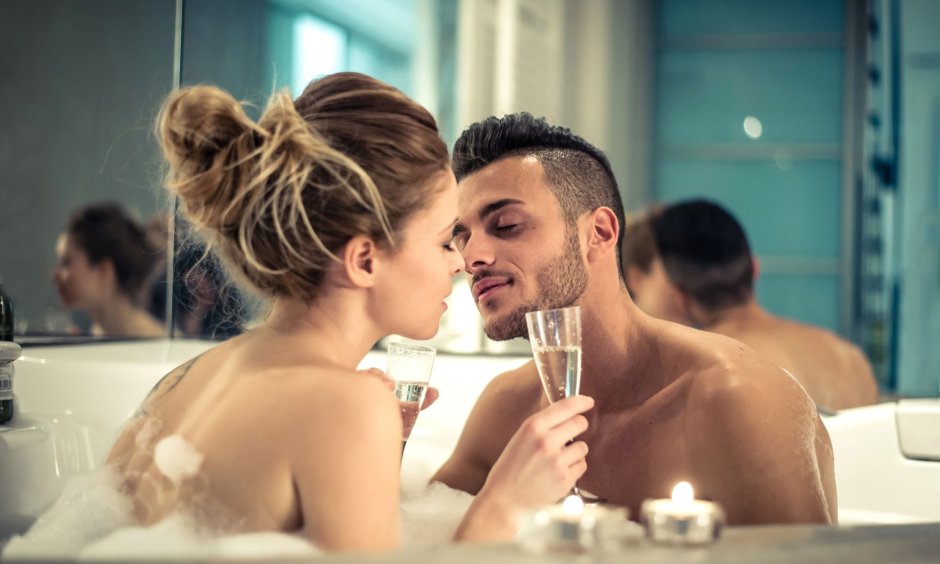 Passionate kiss under the shower