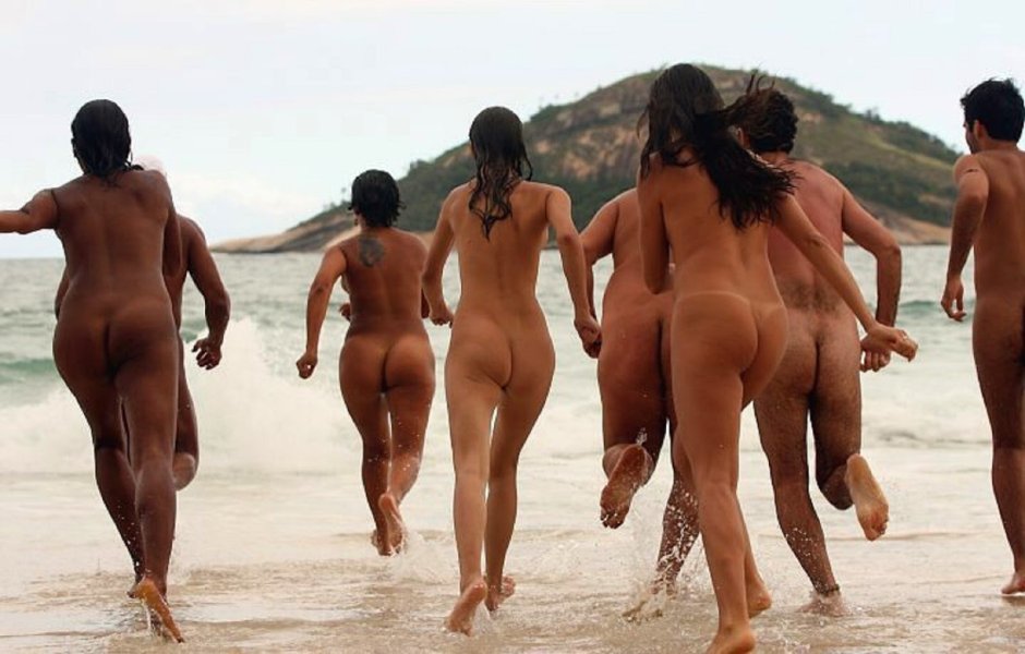 Naked female priests on the beach