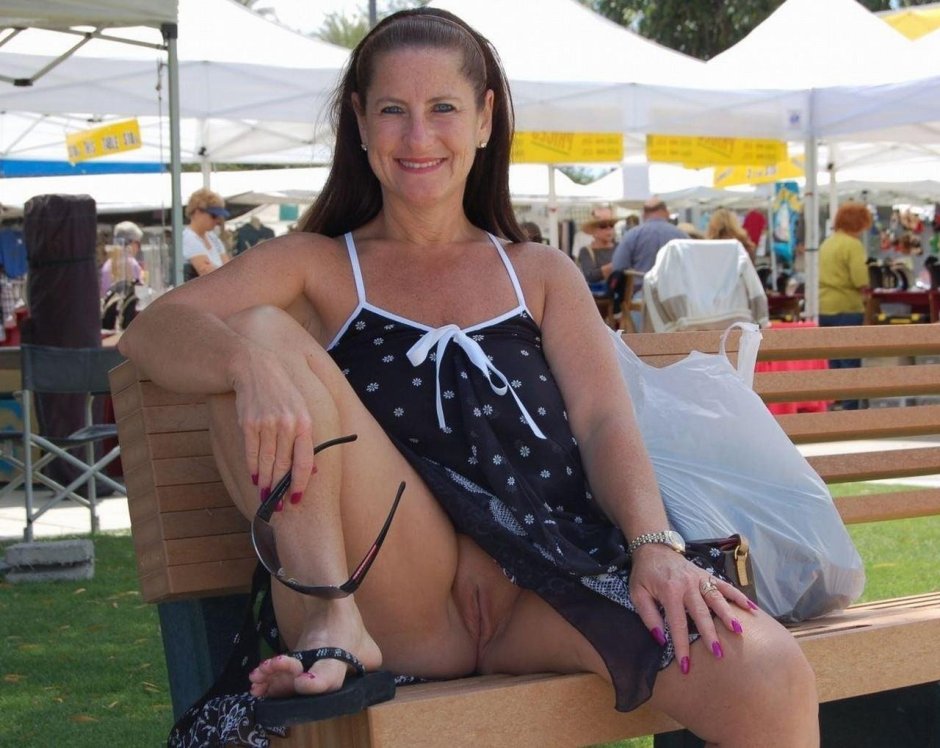 Adult women in a skirt without panties