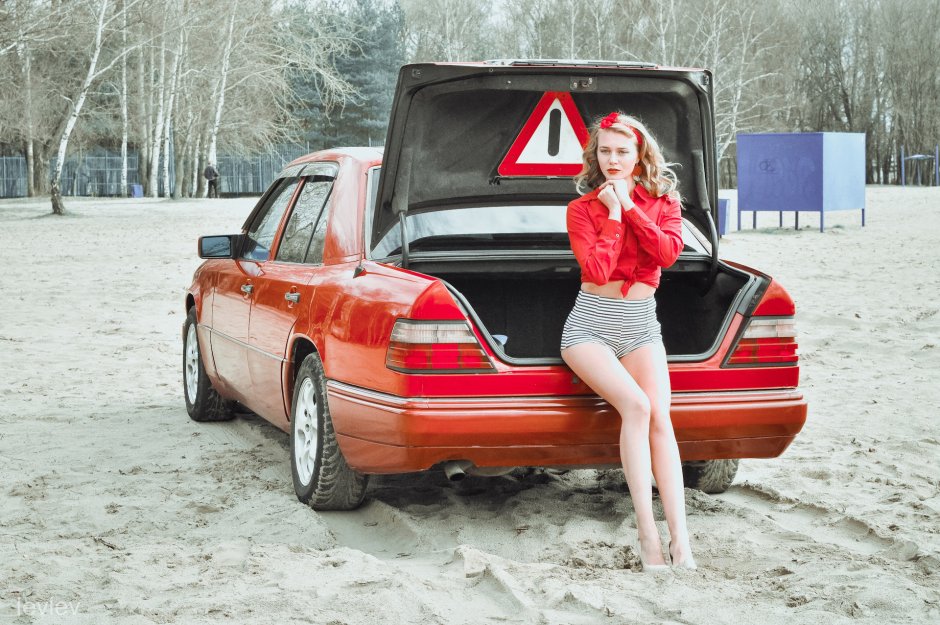 Three girls by car