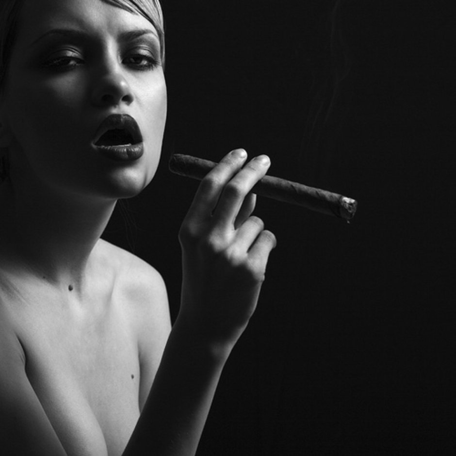 Girl with a cigar in her mouth