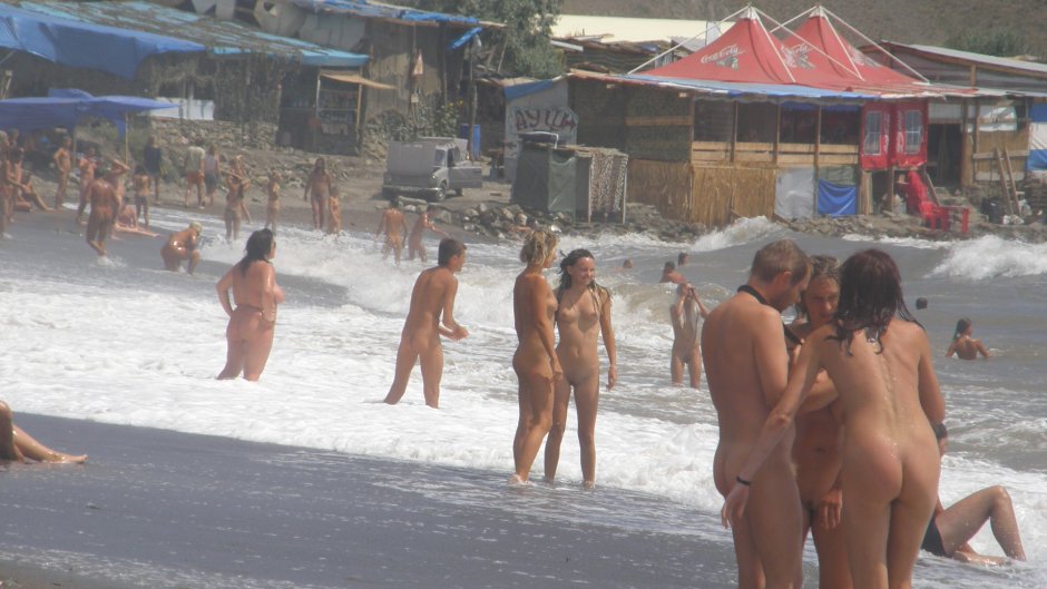 Naked women on the seashore