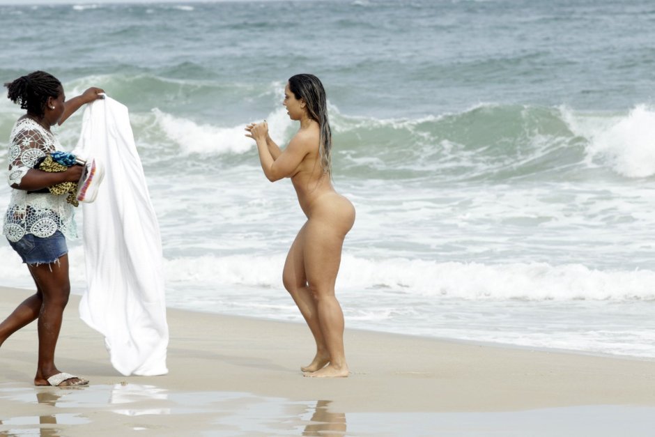 Busty in the sand naked
