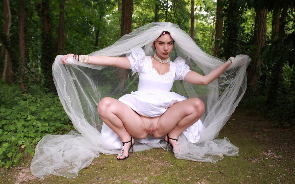 Naked women in wedding dresses