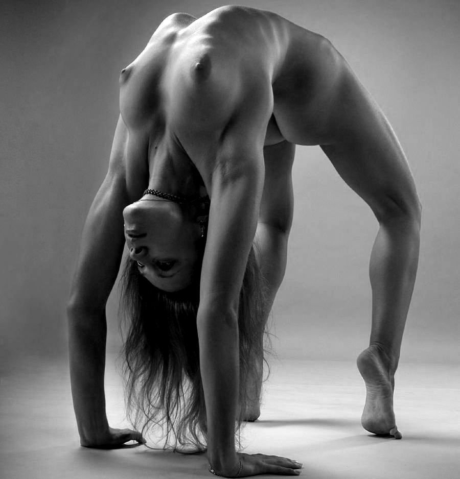Naked gymnasts in the pose of the bridge