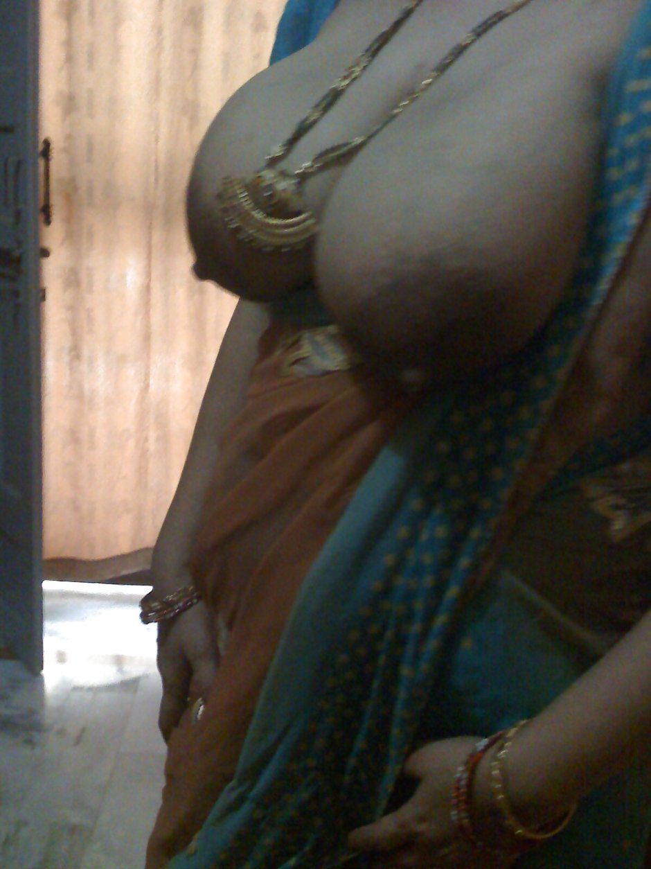 Sexy Indian Bhabhi undresses a girl