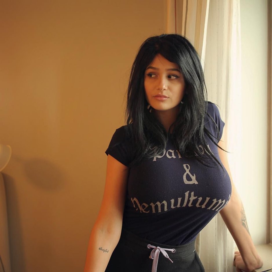 Sadey Ali in a dress