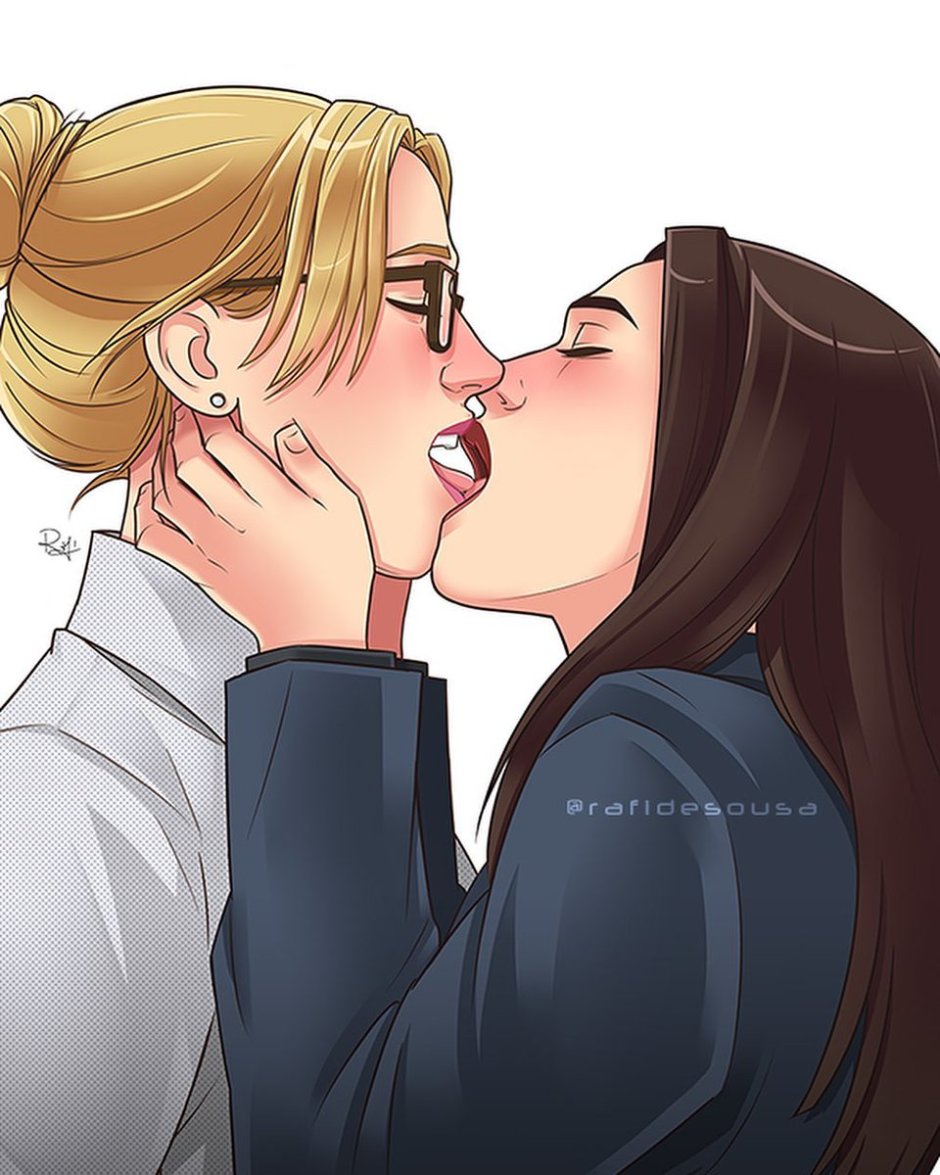 Blonde and brunette kiss