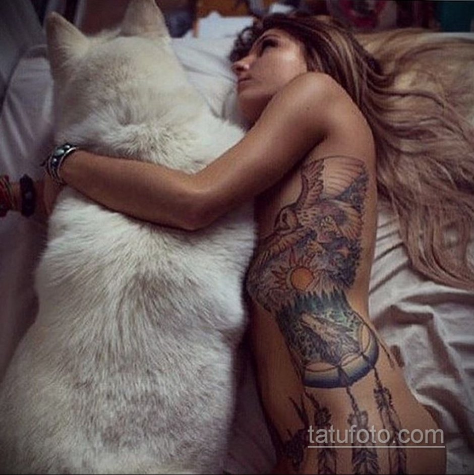 Tattooed girl with a dog