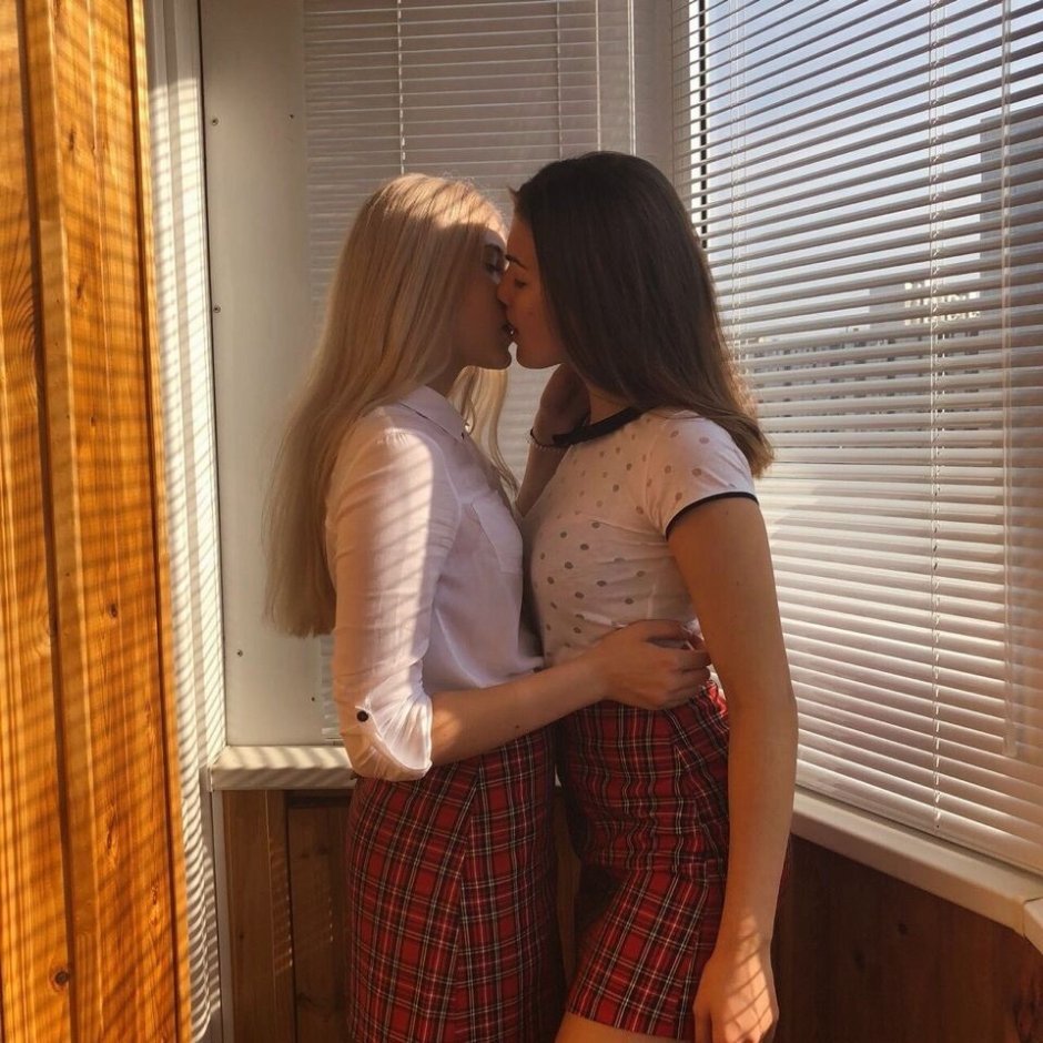Young girls kiss