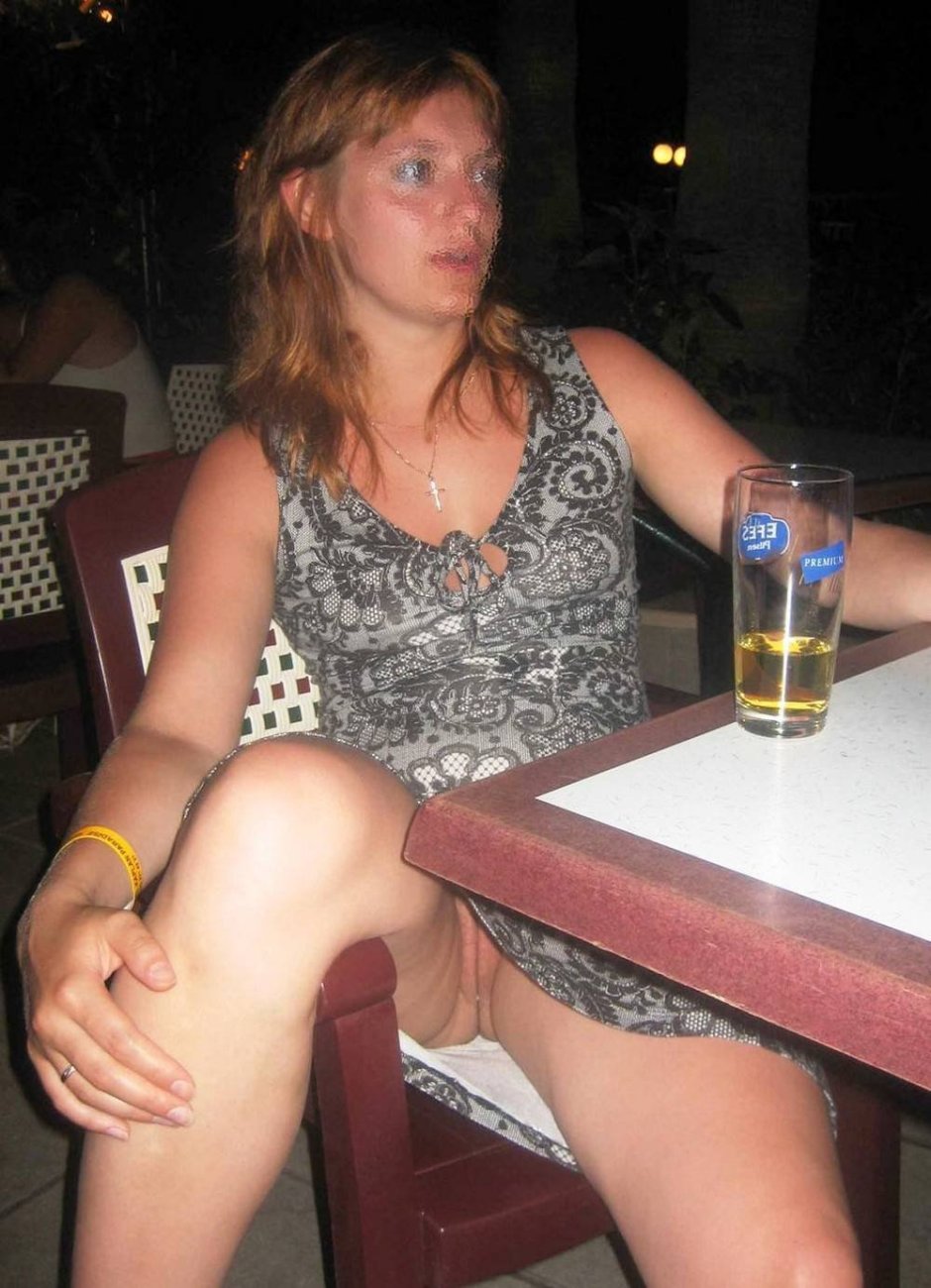 Girls at the table without panties