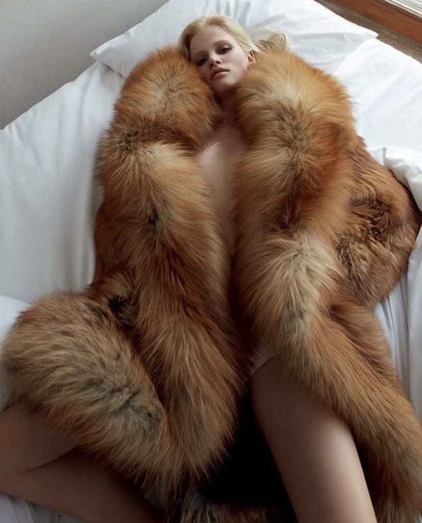 Ashley Robbins in a fur coat