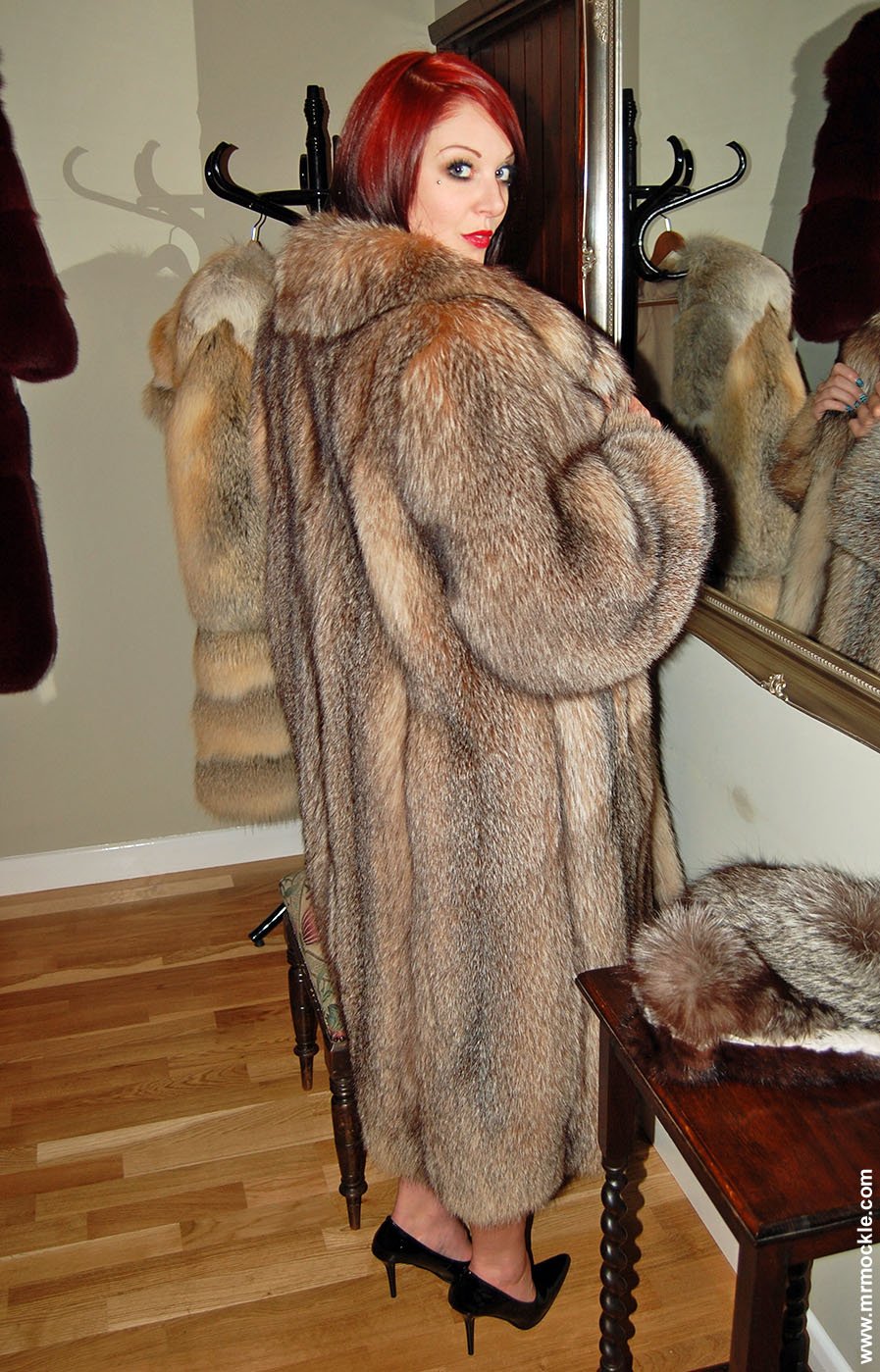 In a fur coat and stilettos
