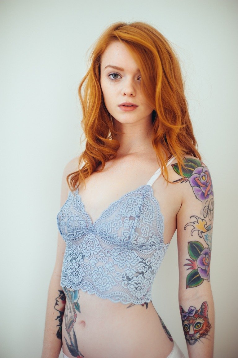 Beautiful red -haired girls in linen