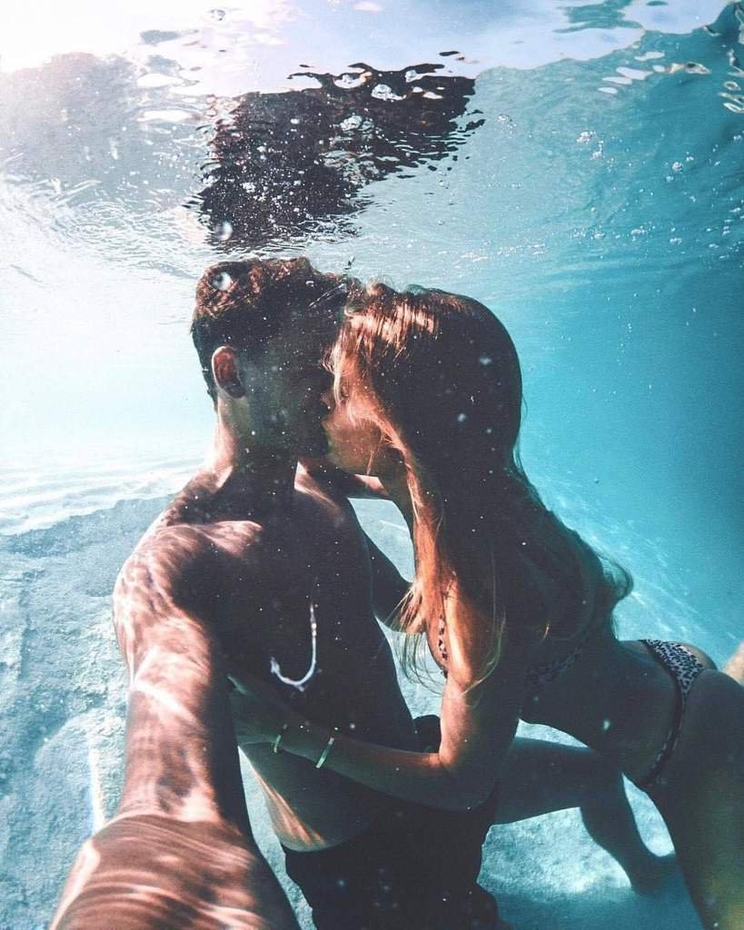 Guy and girl in water