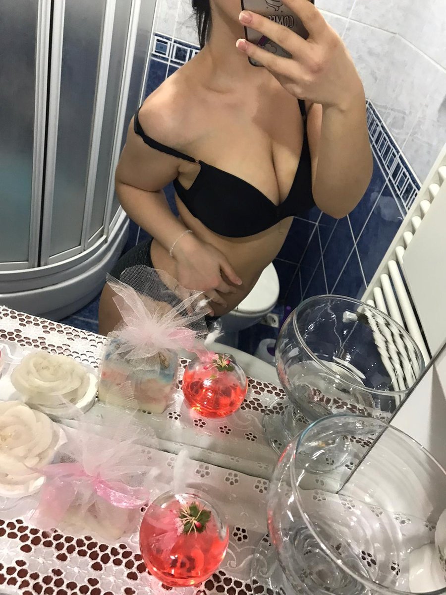 Girls take pictures with pi in the mirror