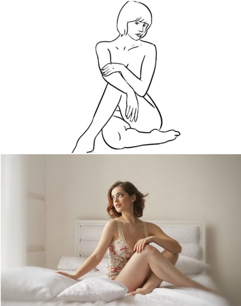 References poses with a book