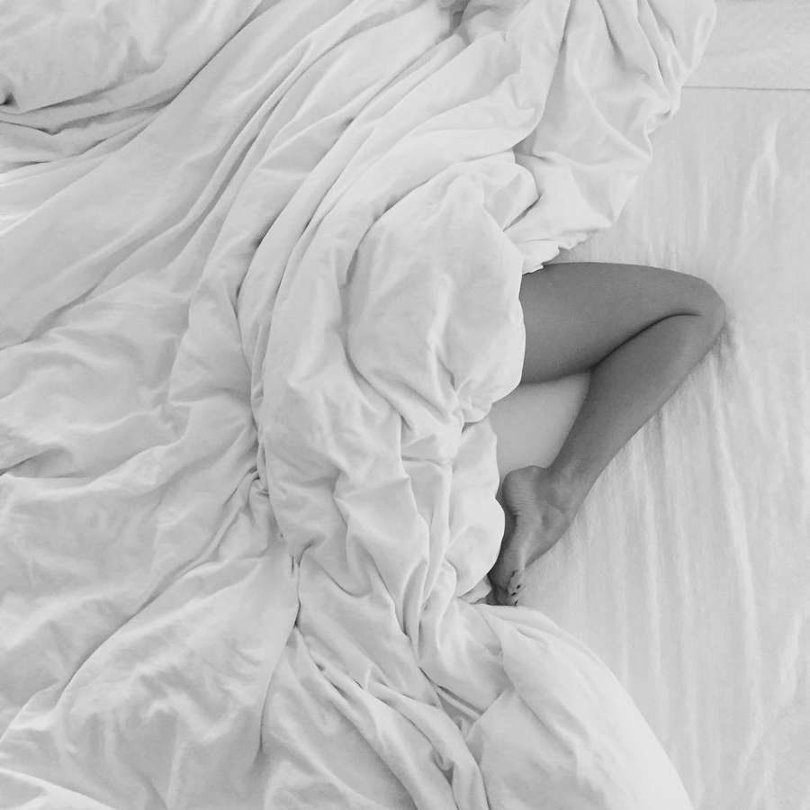Girl in a white sheet