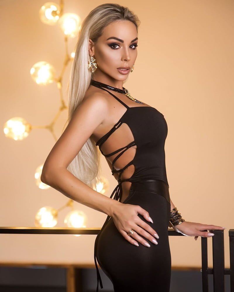 Maria Desiderieva in a short dress