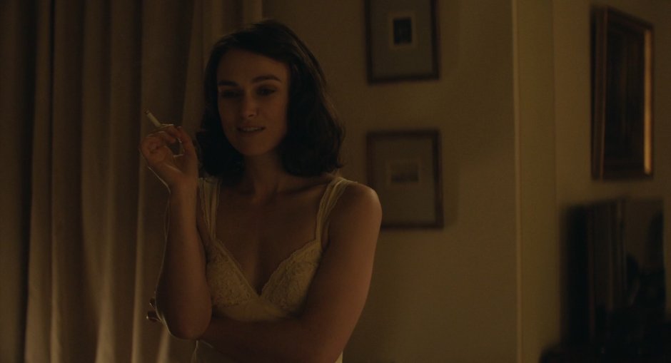 Kira Knightley and Elinor Tomlinson kiss