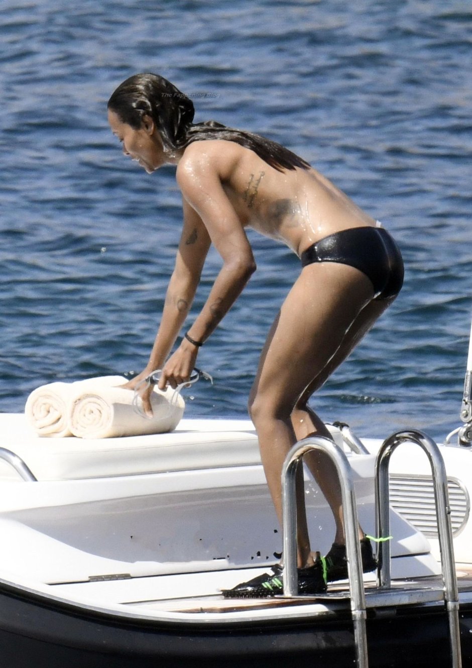 Zoe Saldan on the yacht topless
