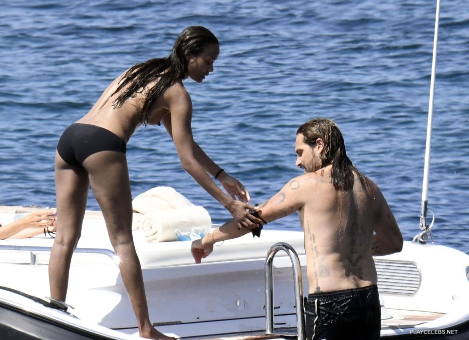 Zoe Saldan on the yacht topless
