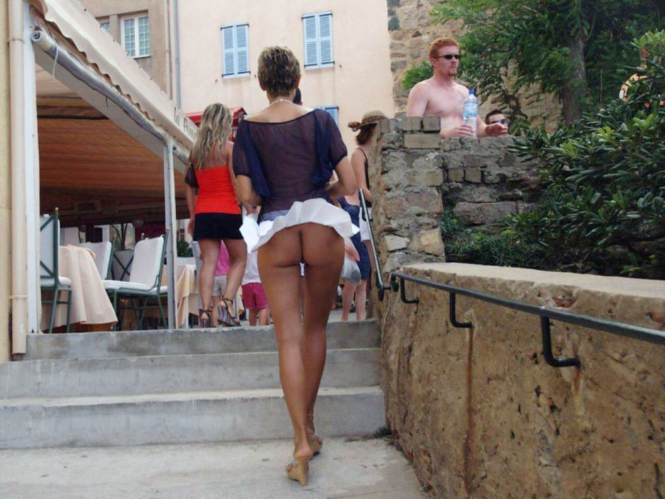 Girls in a mini skirt bent down