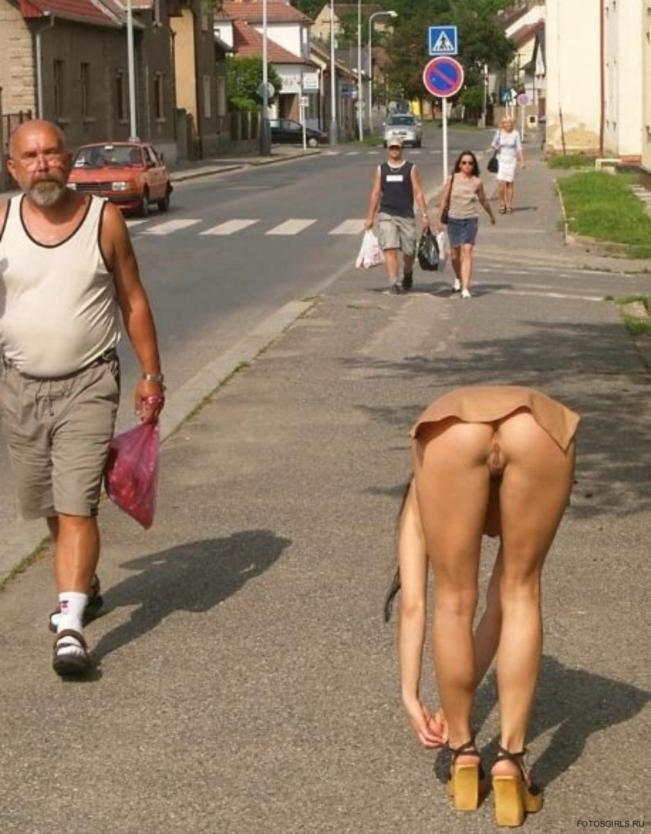 Women in dress and stockings without panties in public