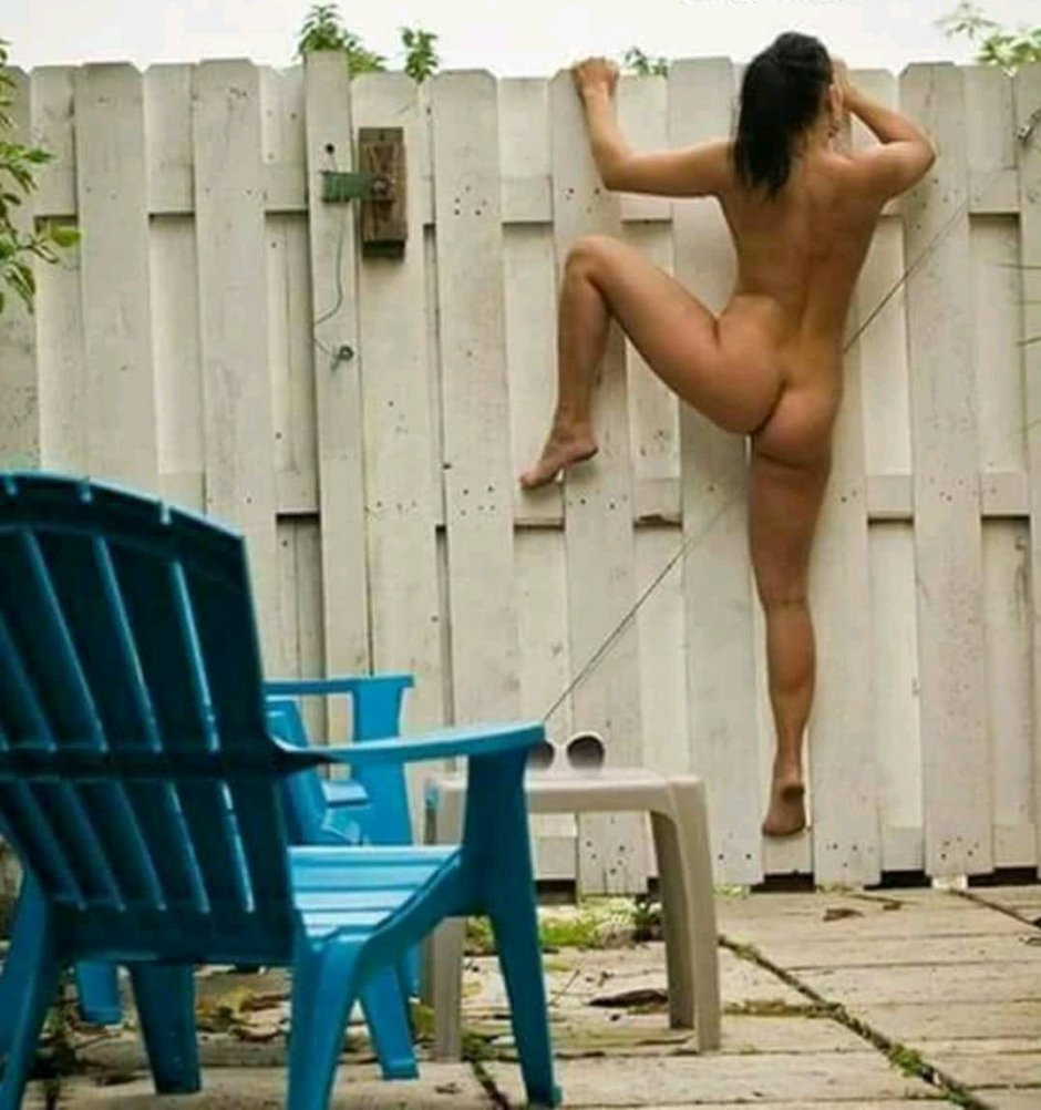 Erotic photo shoot at the fence