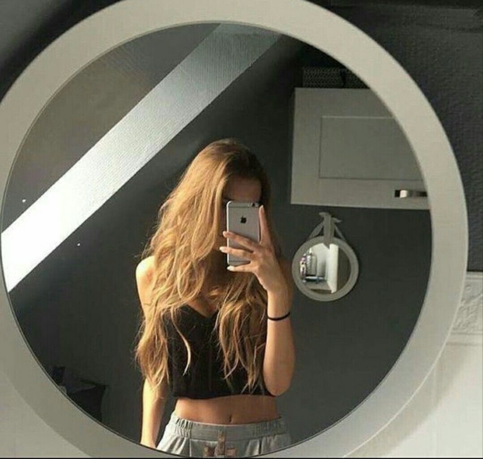 Beautiful girl in the mirror