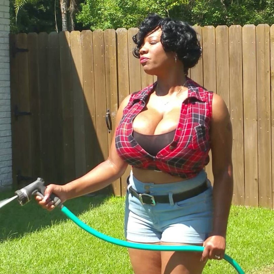 Ebony in a tight dress Milf
