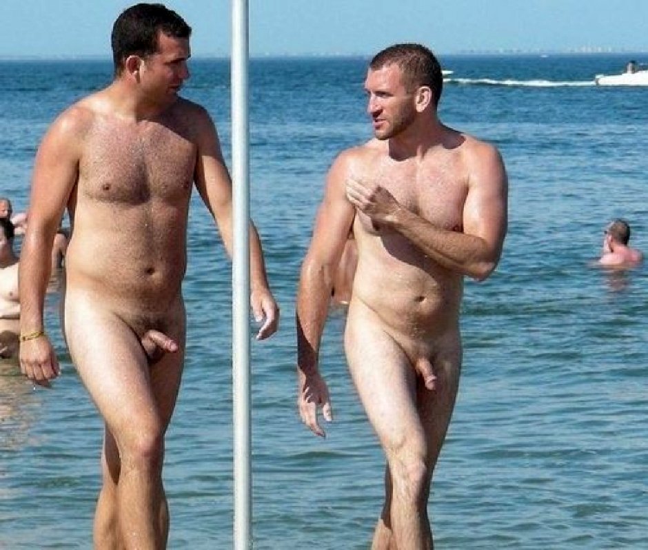 Naked men and women on the beach