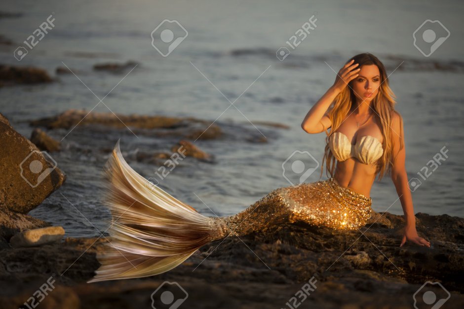 Girl with glasses on the beach