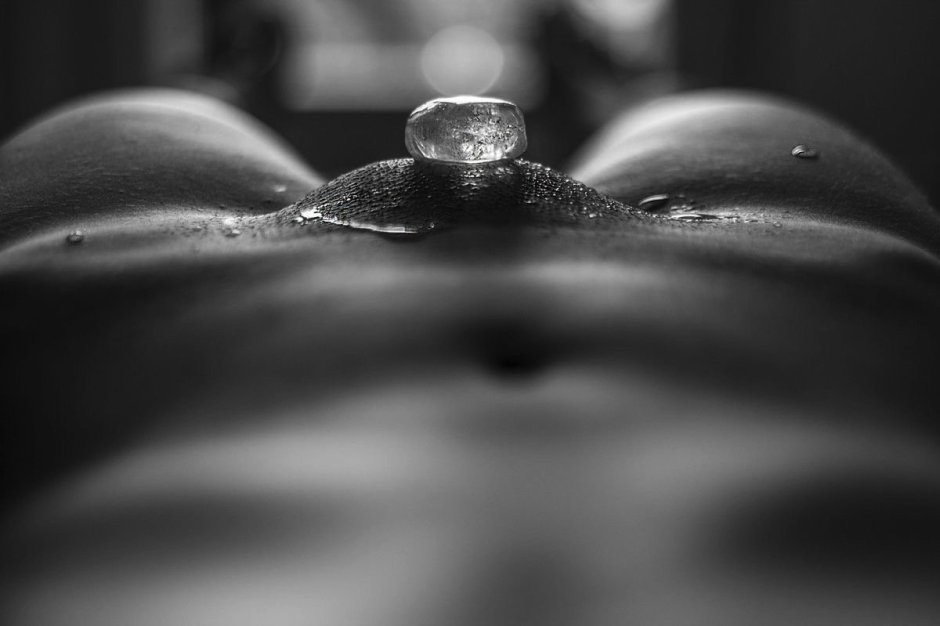 Naked butt on a black background