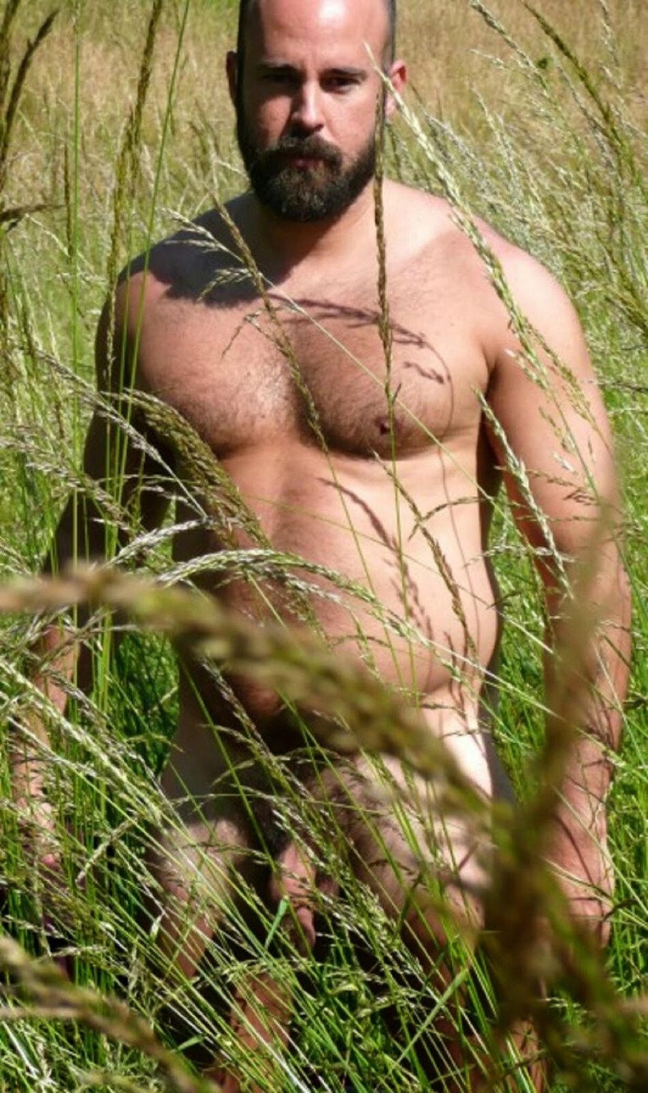 Home nudism of a man