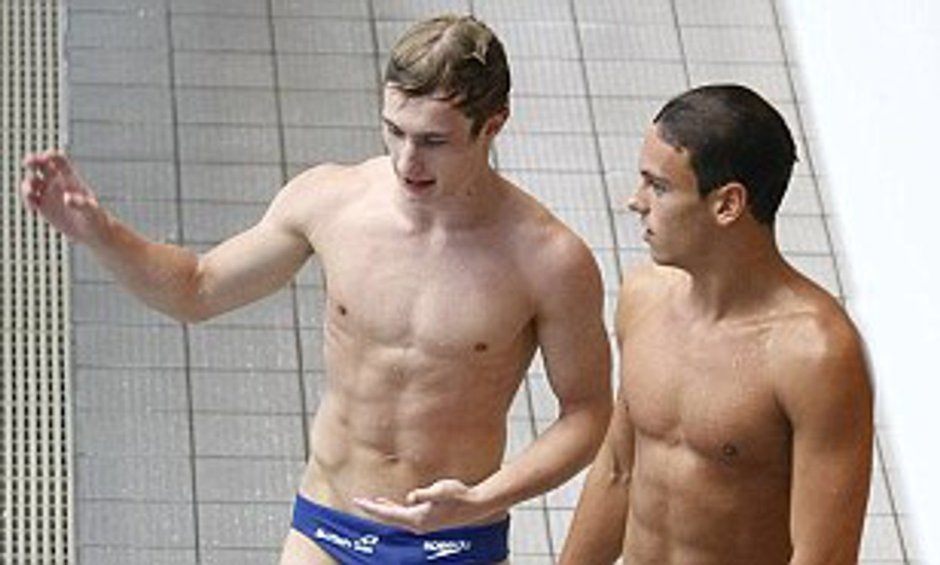 Football players in swimming trunks