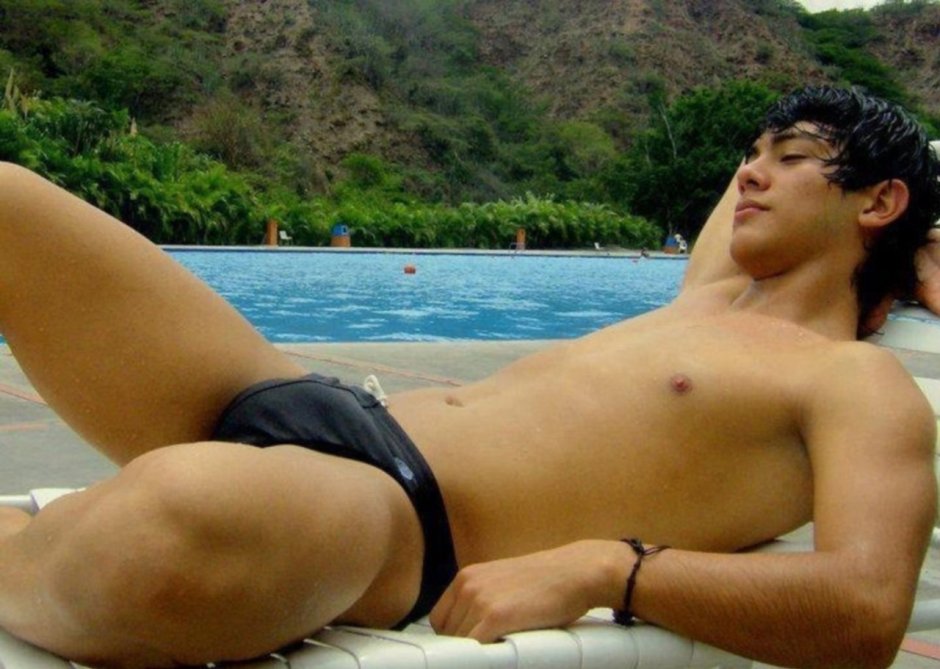 Young guy in swimming trunks