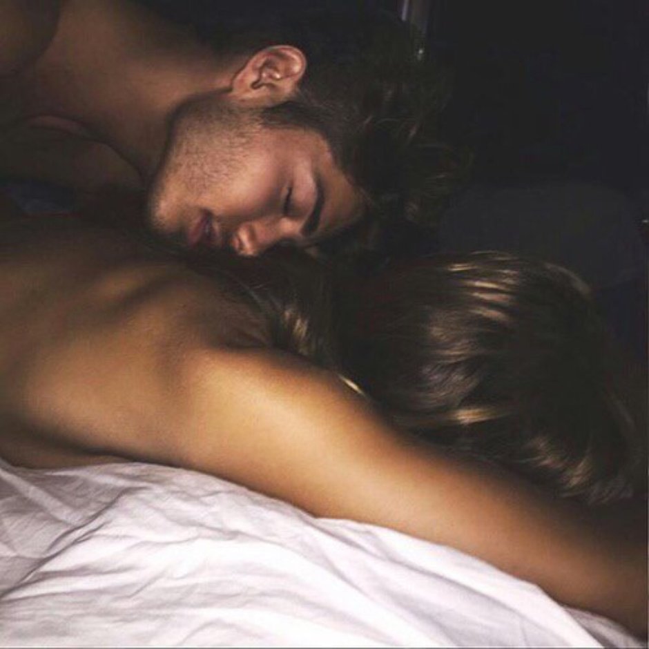 Guy and girl in bed