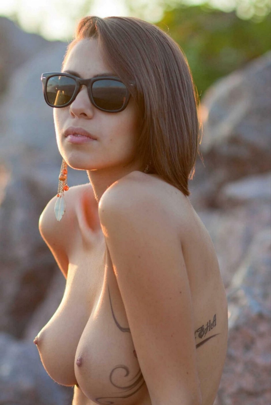 Girl with glasses topless