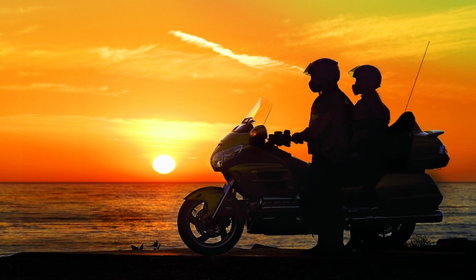 Motorcycle goes to the sunset Honda