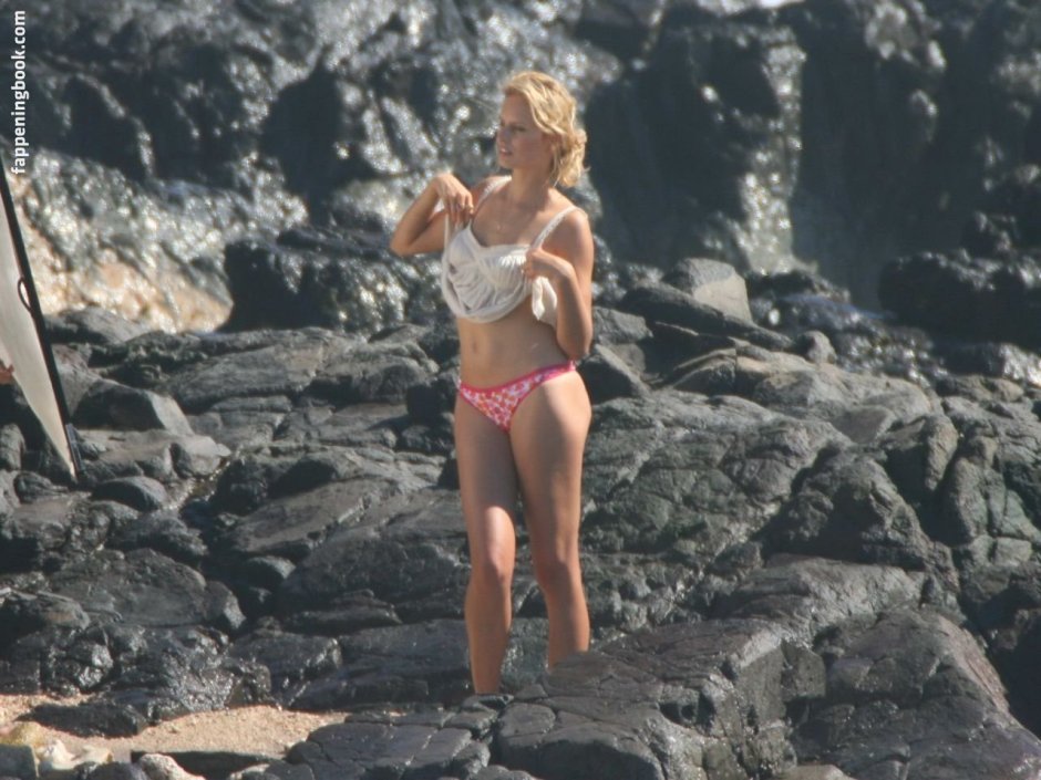 Karolina Kurkova on the beach