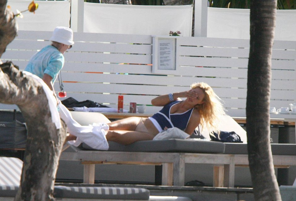 Karolina Kurkova on the beach