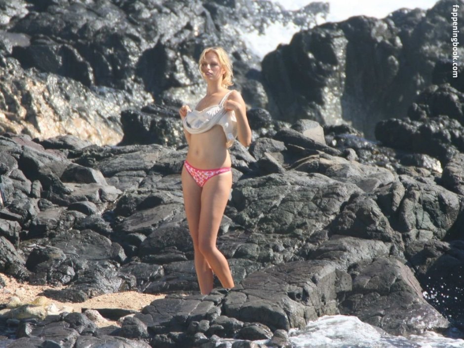 Karolina Kurkova on the beach