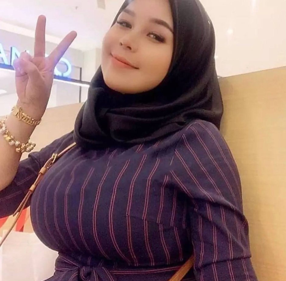 He touches in a hijab