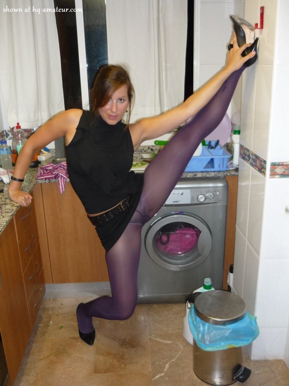 In tights on the balcony