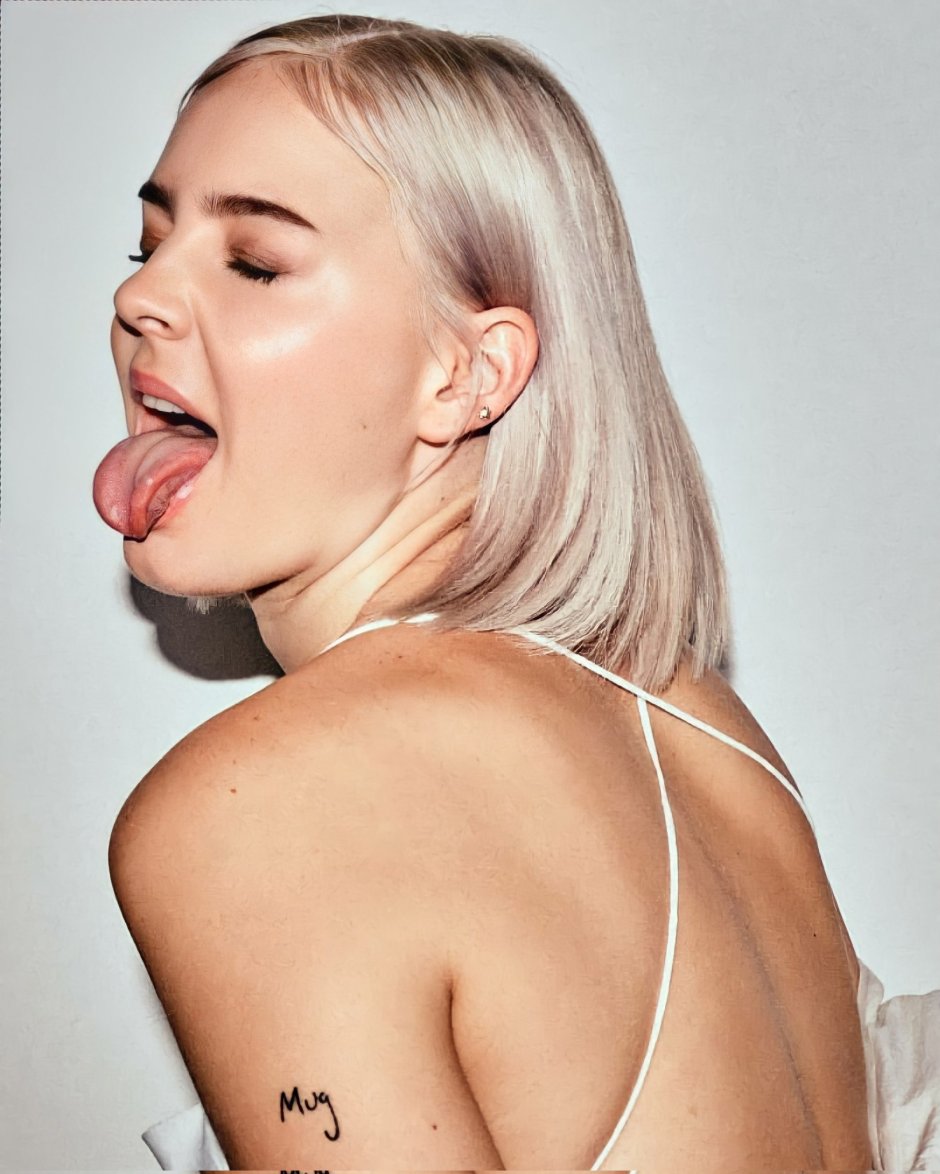 Anne-Marie singer in a swimsuit