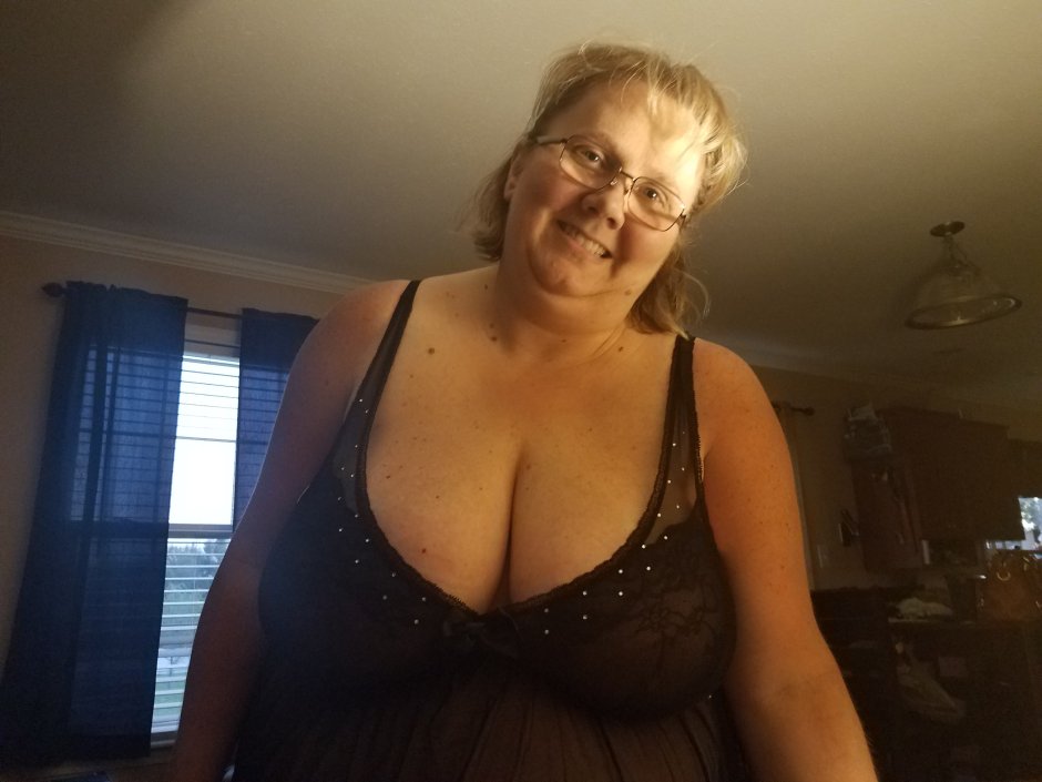 Kendra Last in a dress