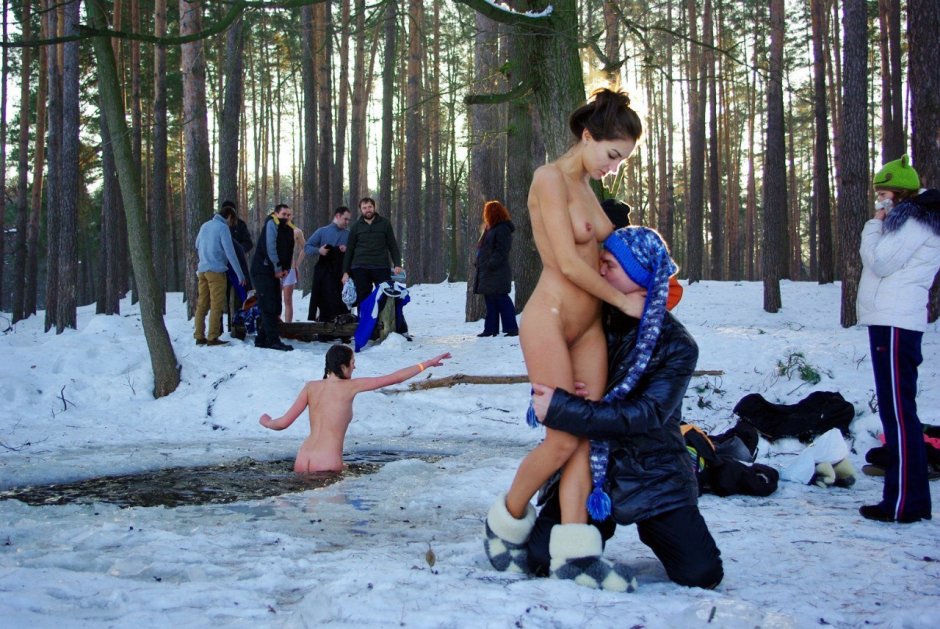 Naked men bathed in an ice hole