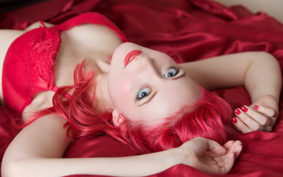 Girl with red hair in lingerie